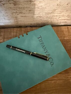 Brand New Tiffany & Co. Blue Notebook with Black and Gold Pen.